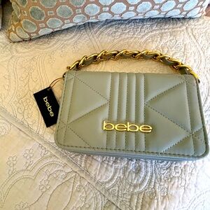 “bebe” Clutch handbag w/braided chain handle - light blue